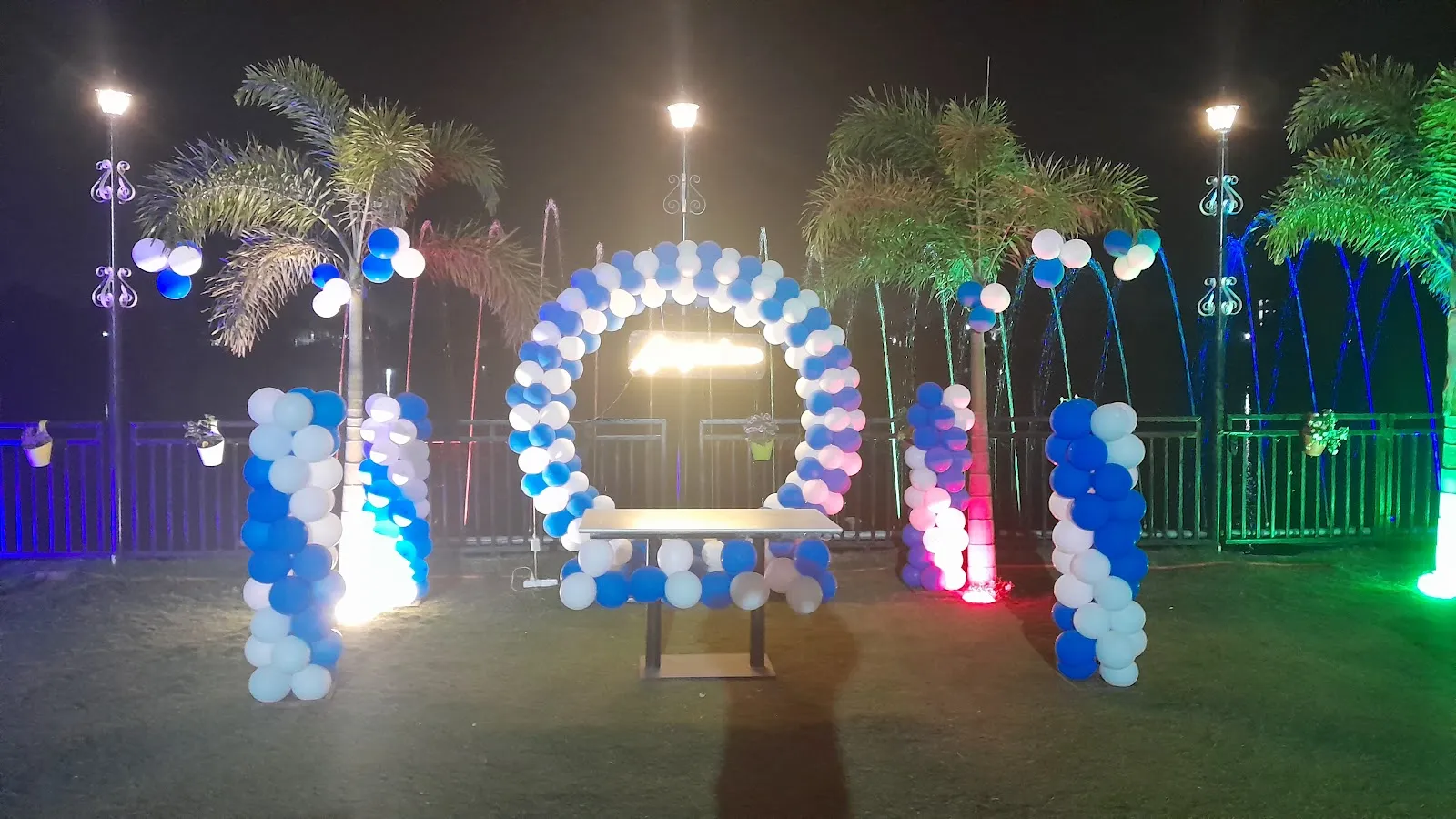 A balloon arch set up on the lawn