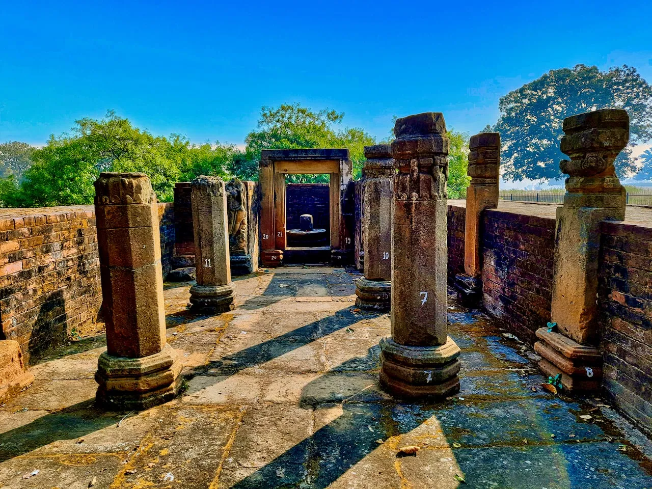 Stone pillars of a ruined temple hall